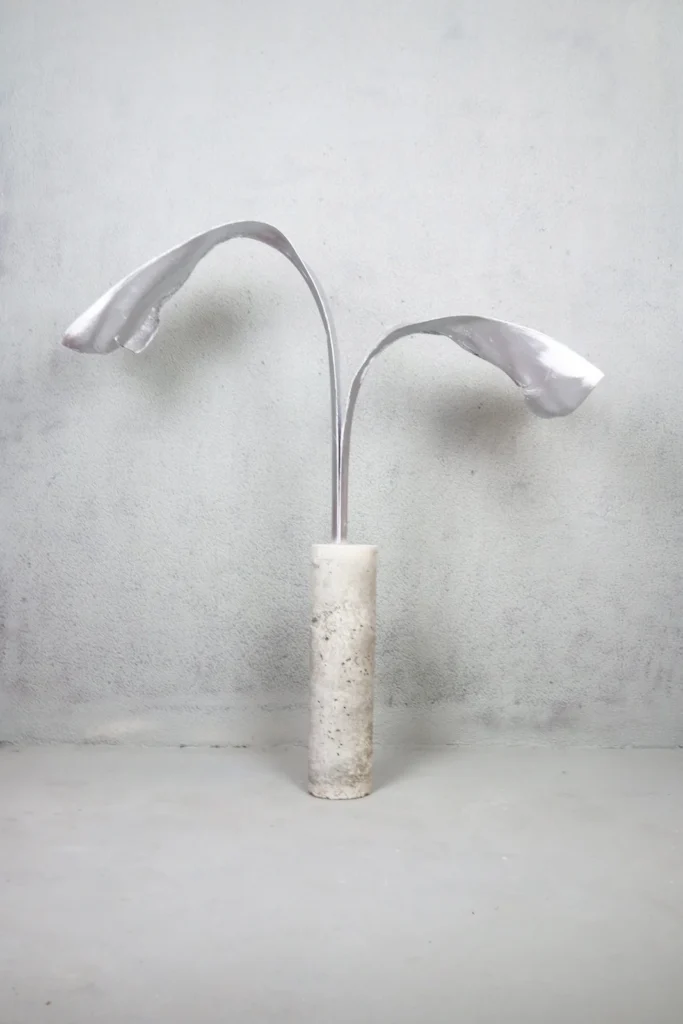 CONCRETE AND PAINTED PALM LEAVES